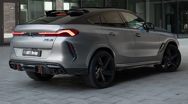 Rear angle view on a BMW X6M F96 LCI Restyling with a body kit giving the car a custom appearance