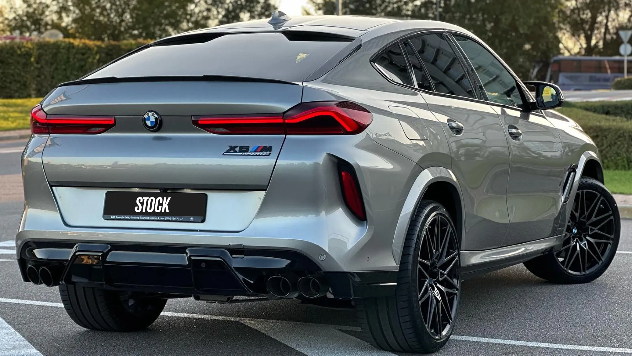 Rear angle view on a BMW X6M with a body kit giving the car a custom appearance