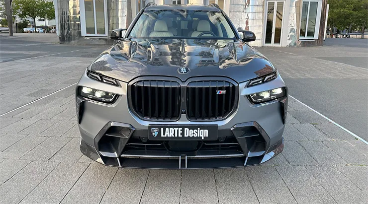 Front view on a BMW X7 with a body kit giving the car a custom appearance