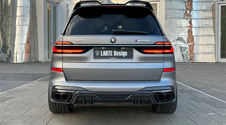 Rear view on a BMW X7 with a body kit giving the car a custom appearance