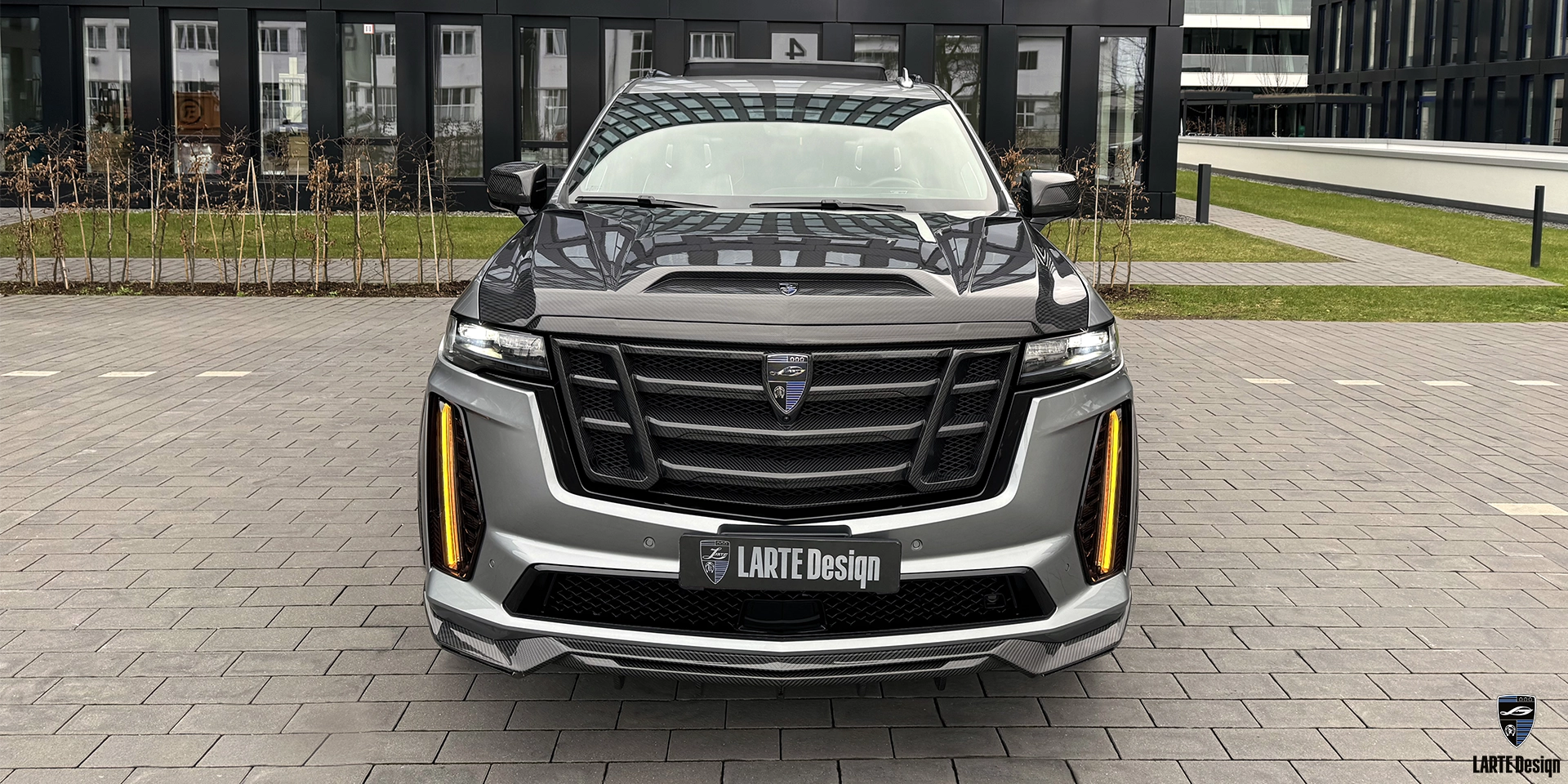 Carbon fiber grille trim in Cadillac Escalade-V ESV body kit by LARTE Design