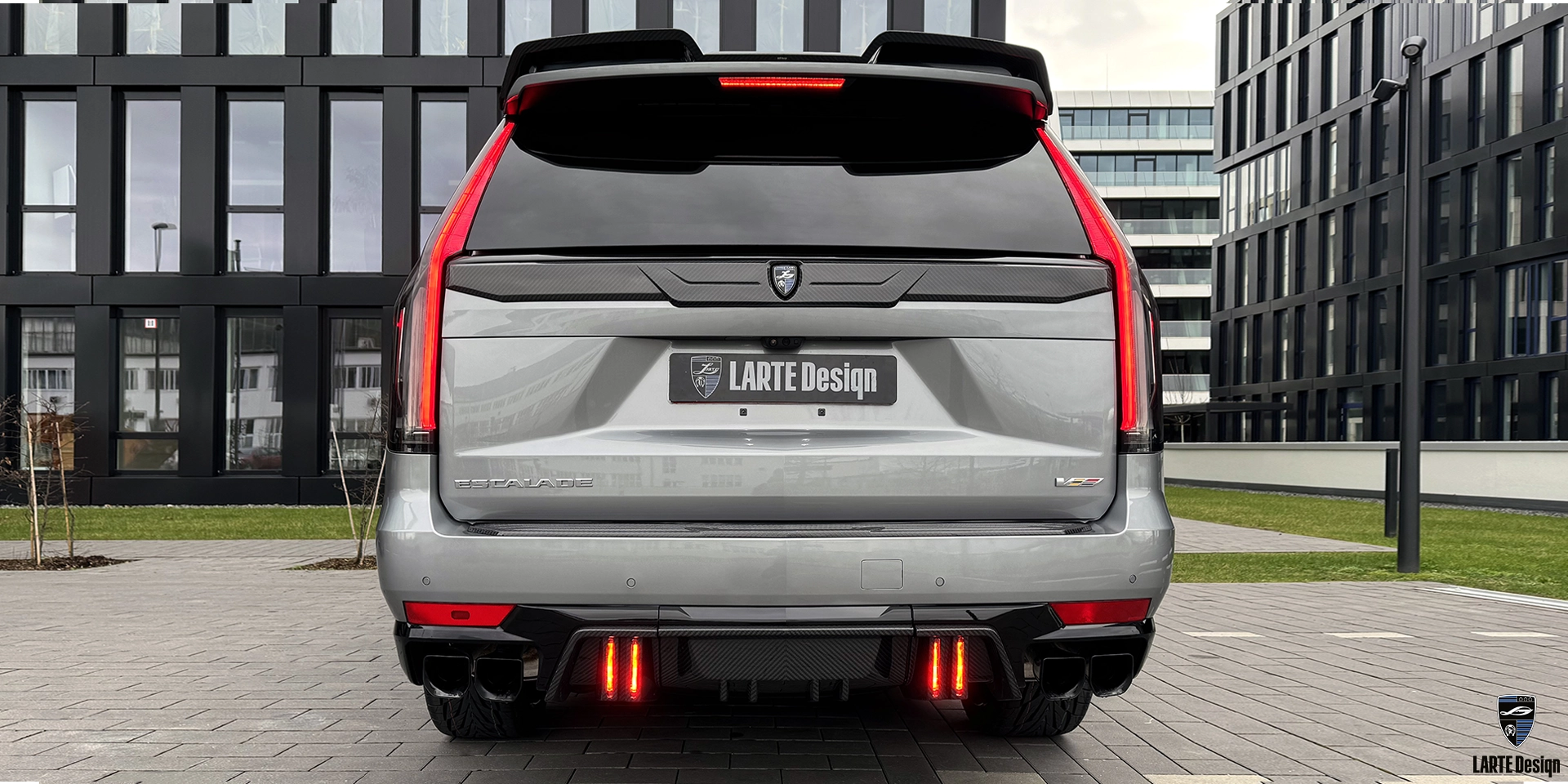 Carbon fiber rear diffuser with brake lights in Cadillac Escalade-V ESV body kit by LARTE Design