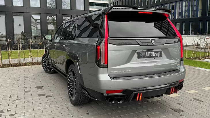 Rear angle view on a Cadillac Escalade V ESV with a body kit giving the car a custom appearance