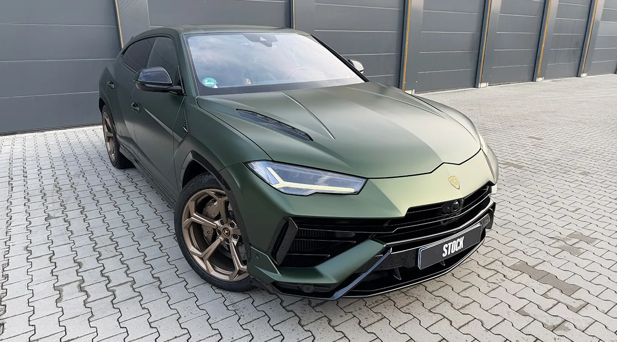 Front angle view on a Lamborghini URUS Performante with a body kit giving the car a custom appearance
