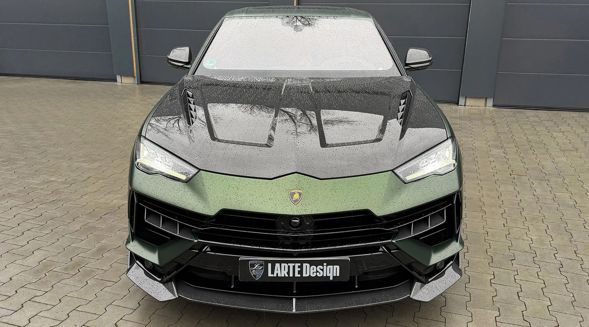 Front view on a Lamborghini URUS Performante with a body kit giving the car a custom appearance