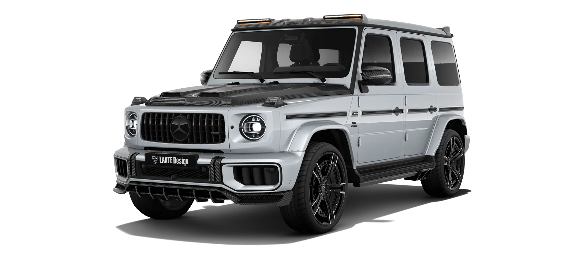 MERCEDES G 63 W463 FACELIFT 2024 - 2026 with carbon body kit: front view shown in Iridium Silver