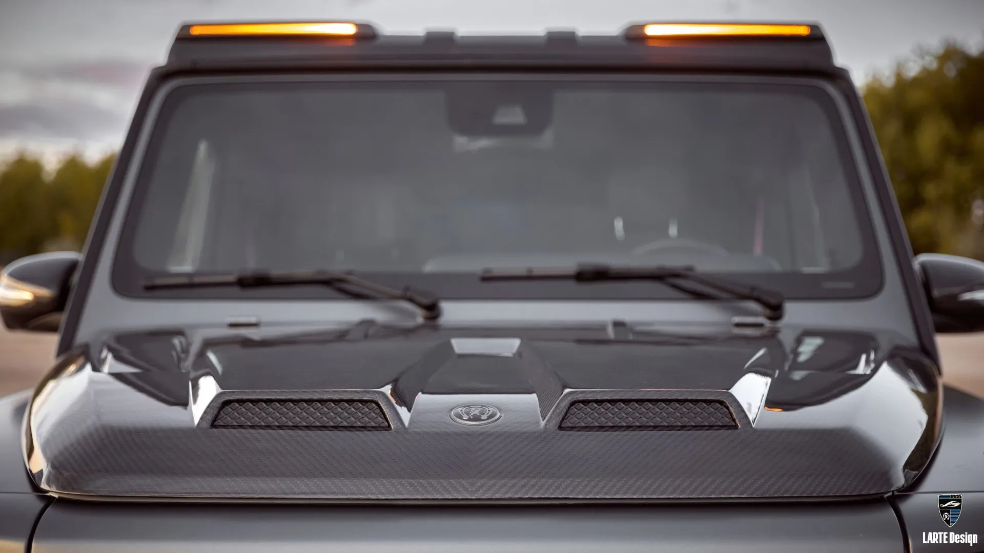 Carbon hood in tuning for Mercedes G63 W463 by LARTE Design