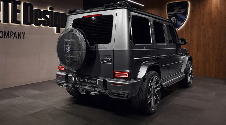 Rear angle view on a Mercedes G63 AMG W463 with a body kit giving the car a custom appearance