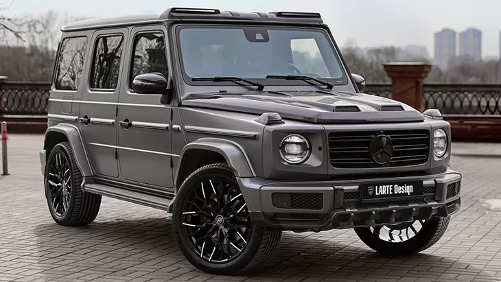 Front angle view on a Mercedes G class W463 with a body kit giving the car a custom appearance