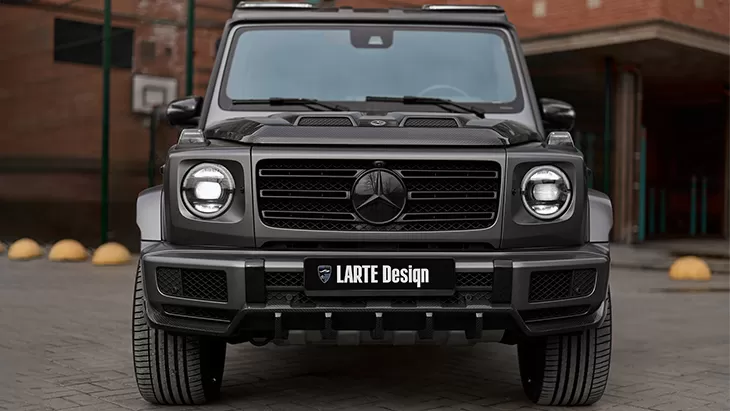 Front view on a Mercedes G class W463 with a body kit giving the car a custom appearance
