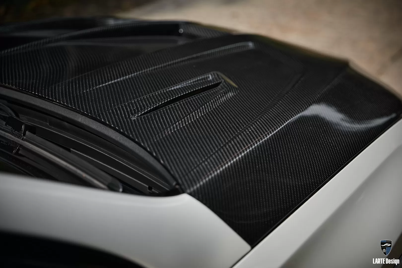 Detailed look on side of carbon hood for Mercedes Benz AMG GLE Coupe 63 by LARTE Design