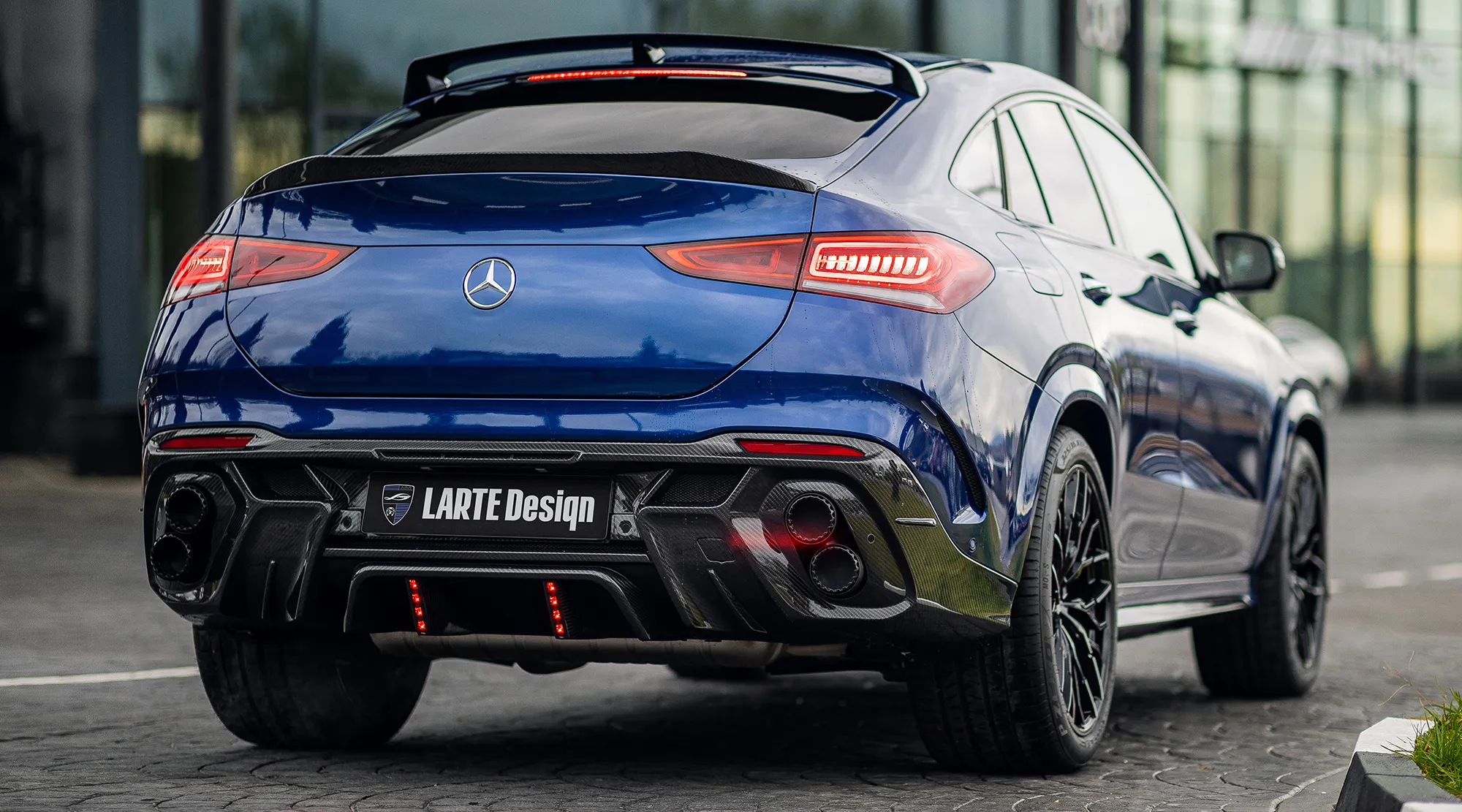 Rear angle view on a Mercedes GLE Coupe C167 with a body kit giving the car a custom appearance