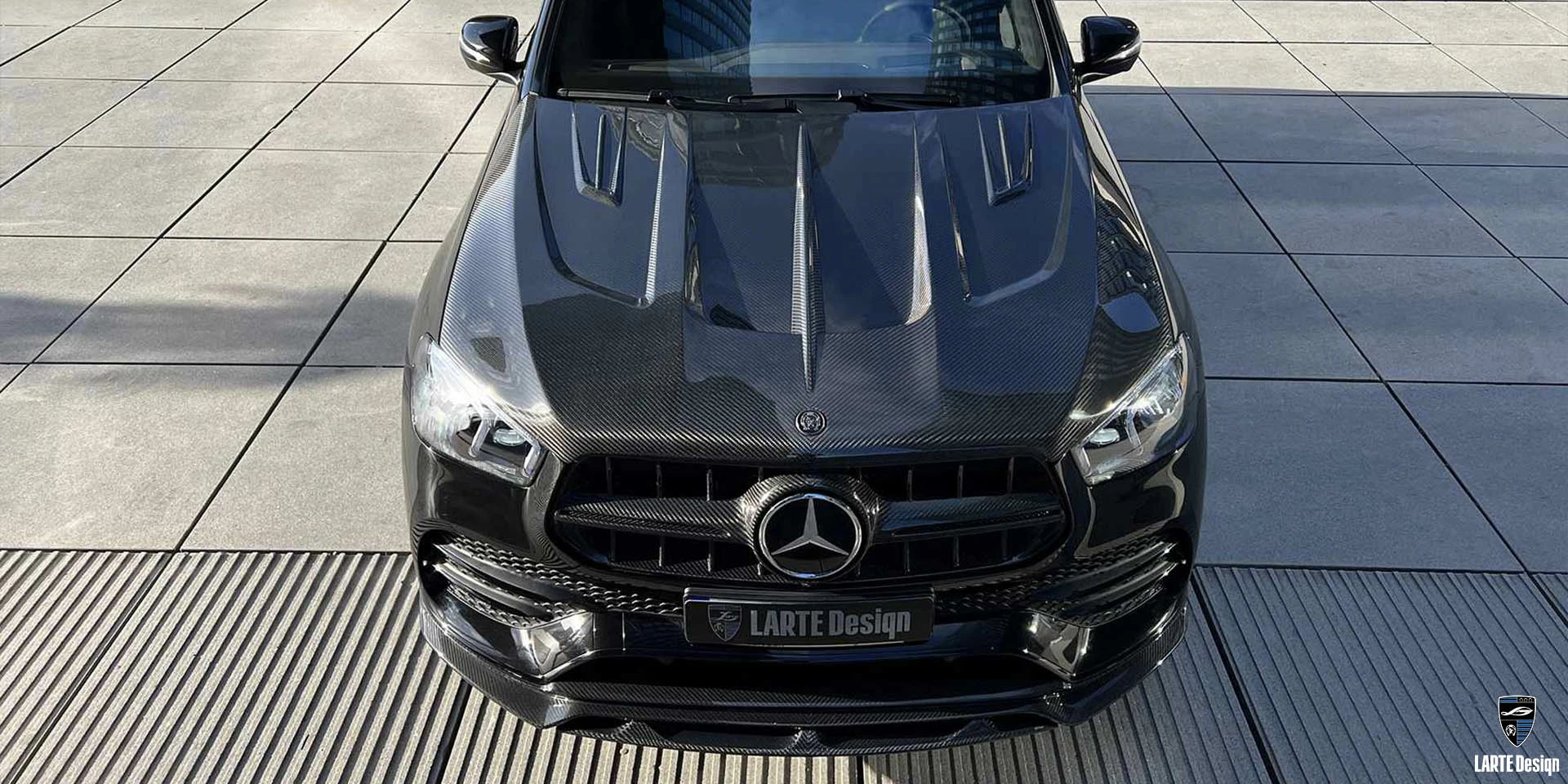 Kaufen Sie eine individuelle Motorhaube aus Kohlefaser für den Mercedes-AMG GLE 53 4MATIC+ in Obsidianschwarz metallic