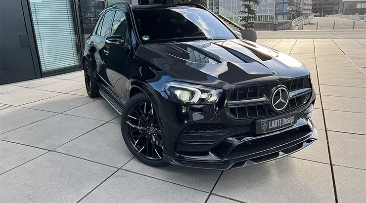 Front angle view on a Mercedes GLE V167 with a body kit giving the car a custom appearance