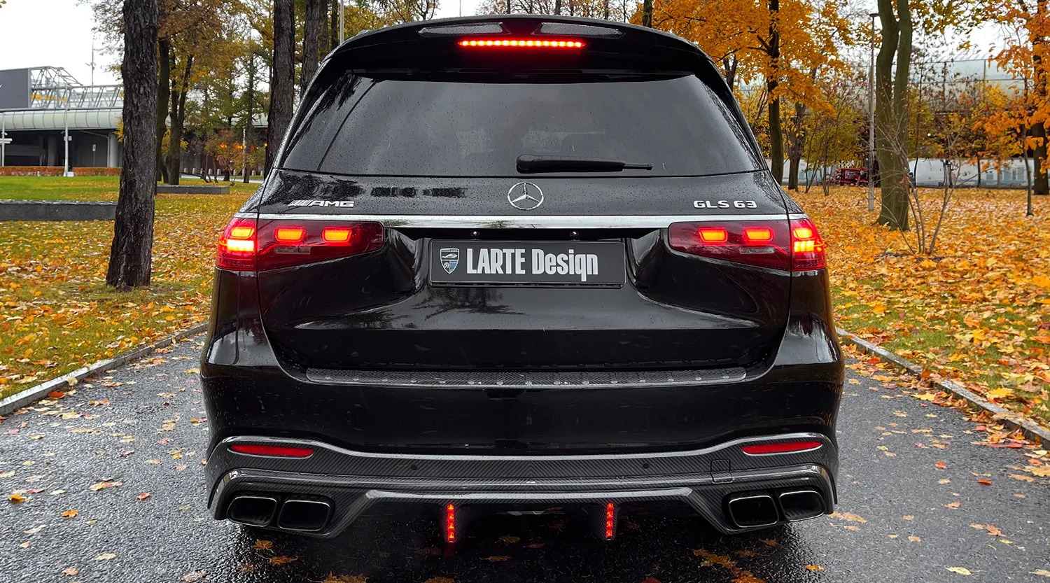 Rear view on a Mercedes GLS AMG 63 X167 Facelift with a body kit giving the car a custom appearance