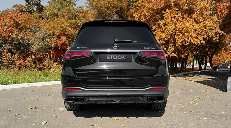 Rear view on a Mercedes GLS AMG 63 X167 Facelift with a body kit giving the car a custom appearance
