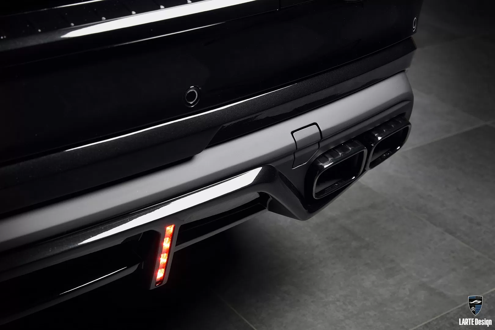 Closeup on a painted rear diffuser for Mercedes-Maybach GLS 600 X167 4MATIC M 176