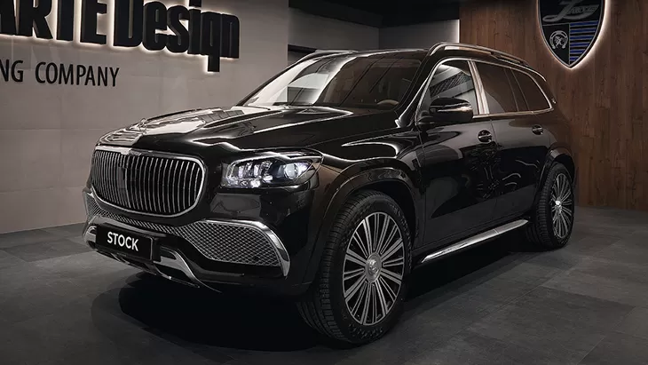 Front angle view on a Mercedes Maybach GLS 600 with a body kit giving the car a custom appearance