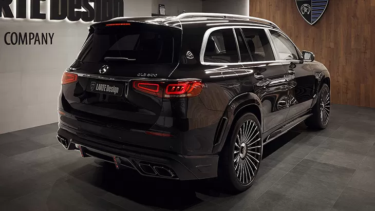 Rear angle view on a Mercedes Maybach GLS 600 with a body kit giving the car a custom appearance