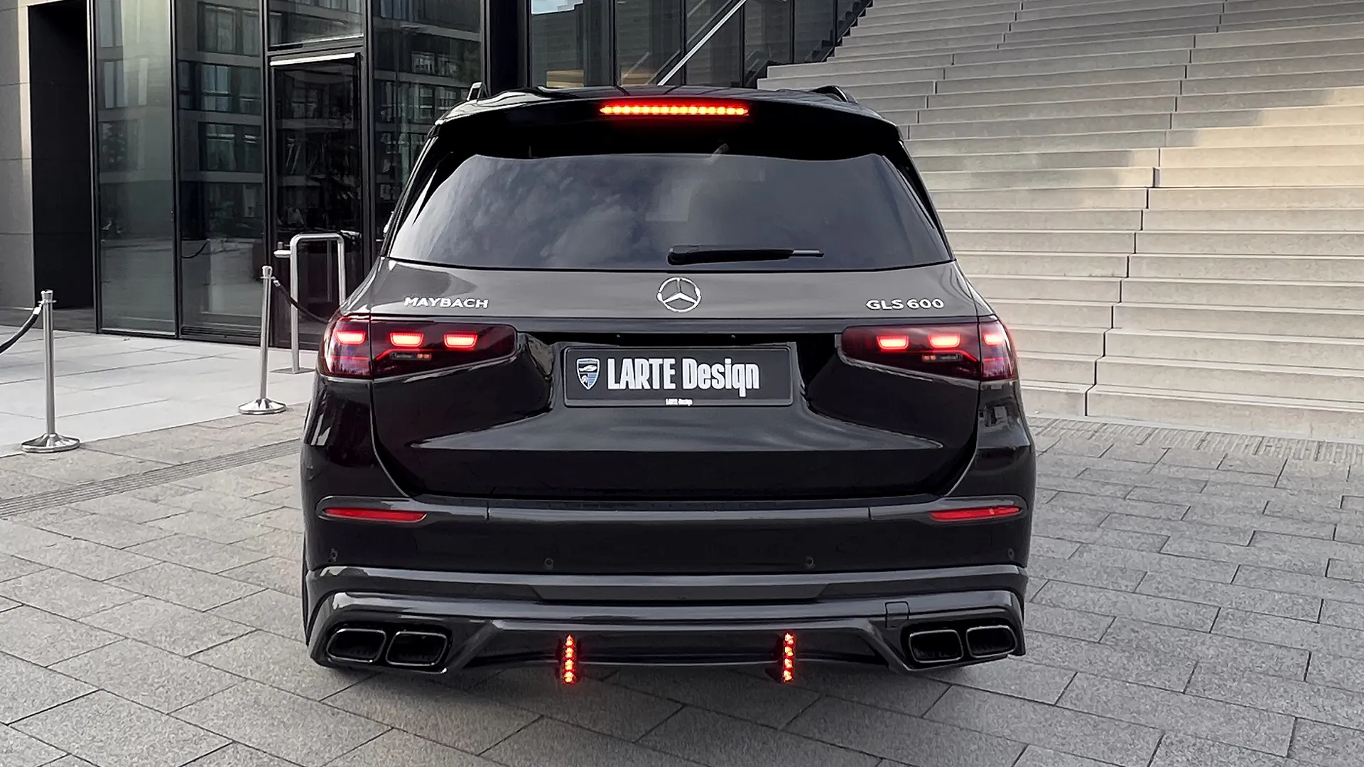 Rear view on a Mercedes Maybach GLS 600 Facelift 2025 with a body kit giving the car a custom appearance