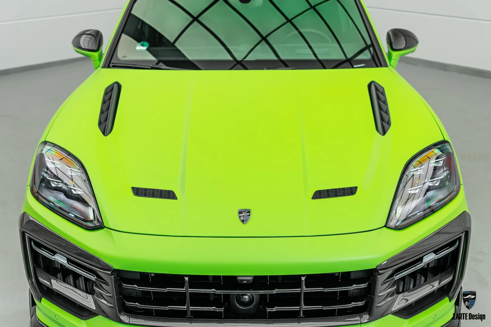 Porsche Cayenne bonnet elevates vehicle design with a custom look.