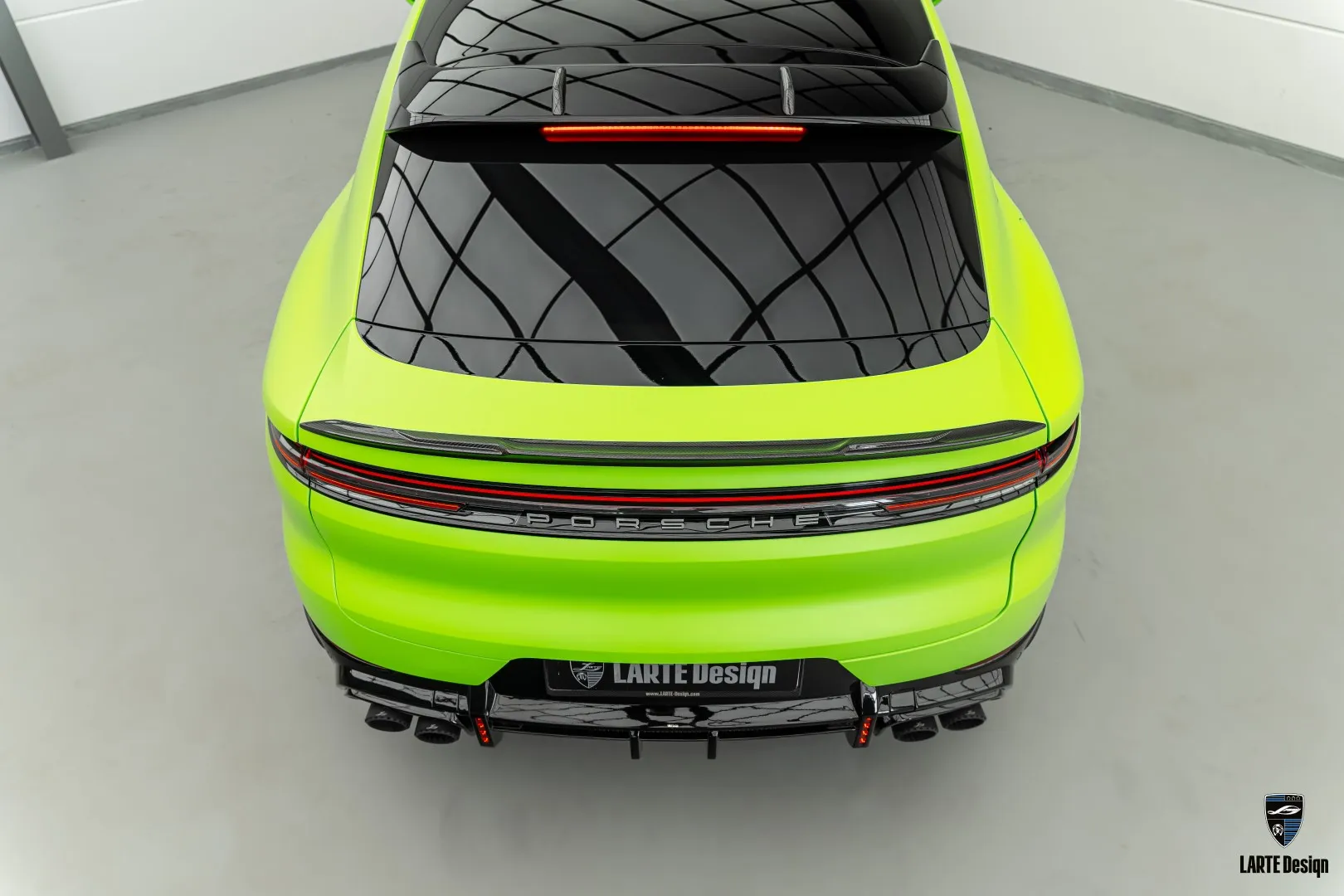 Functional rear lip spoiler overlays for Porsche Cayenne models, made in Germany by Larte Design.