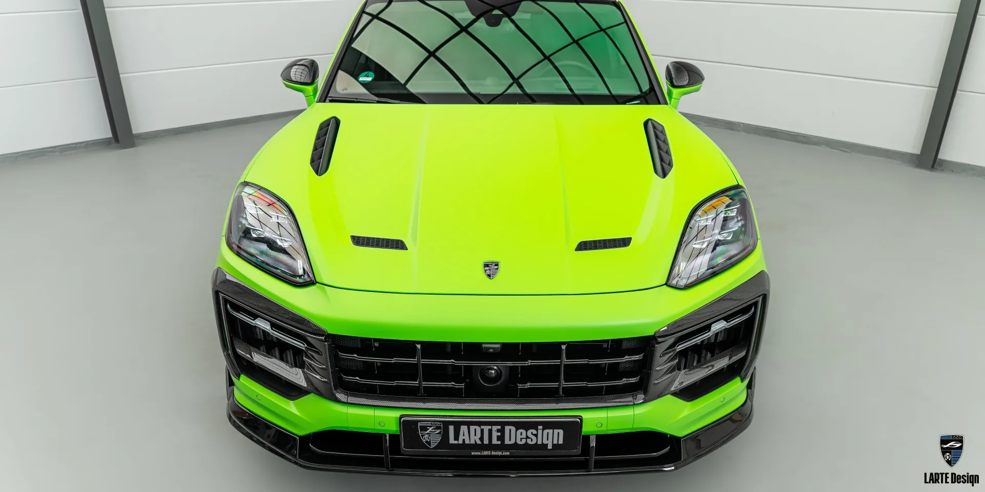 Full body kit by Larte Design for Porsche Cayenne featuring sporty design elements.