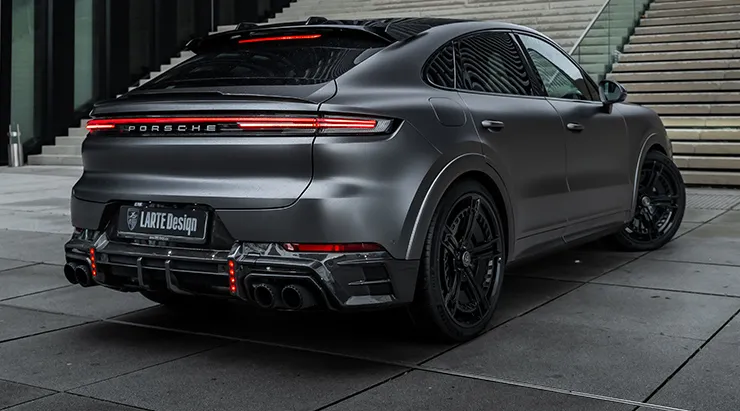 Rear angle view on a Porsche Cayenne S Coupe with a body kit giving the car a custom appearance