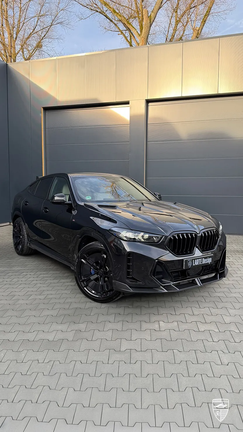 Black BMW X6 front view with body kit by Larte Design
