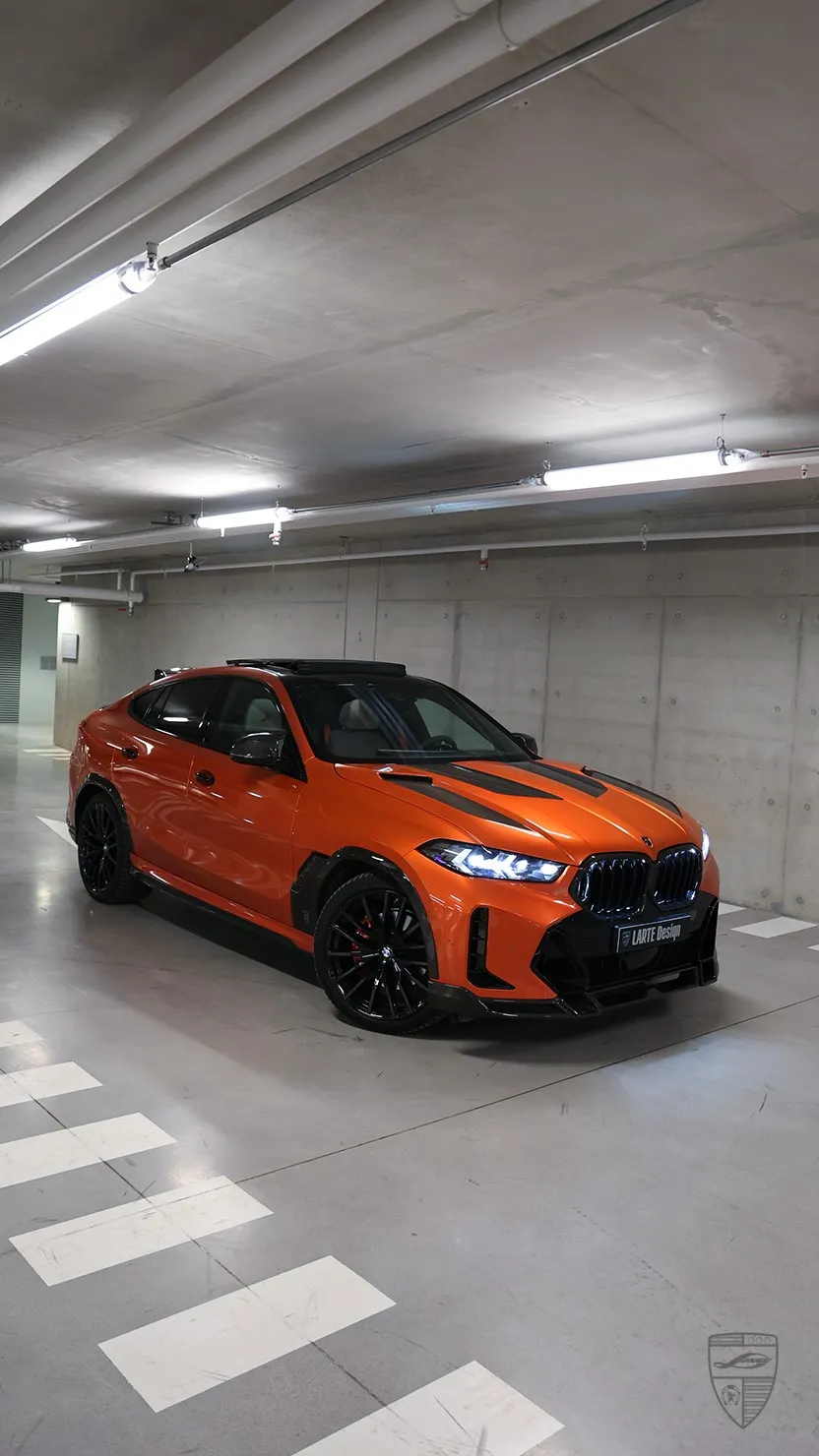 BMW X6 G06 LCI in orange with custom body kit and distinctive exterior design