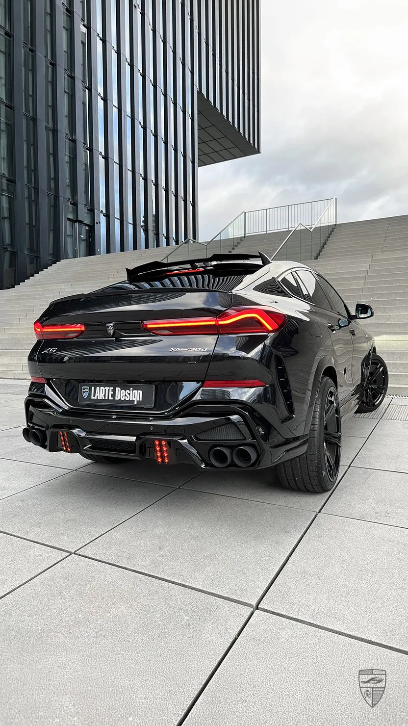 BMW X6 rear view with body kit by Larte Design in urban setting