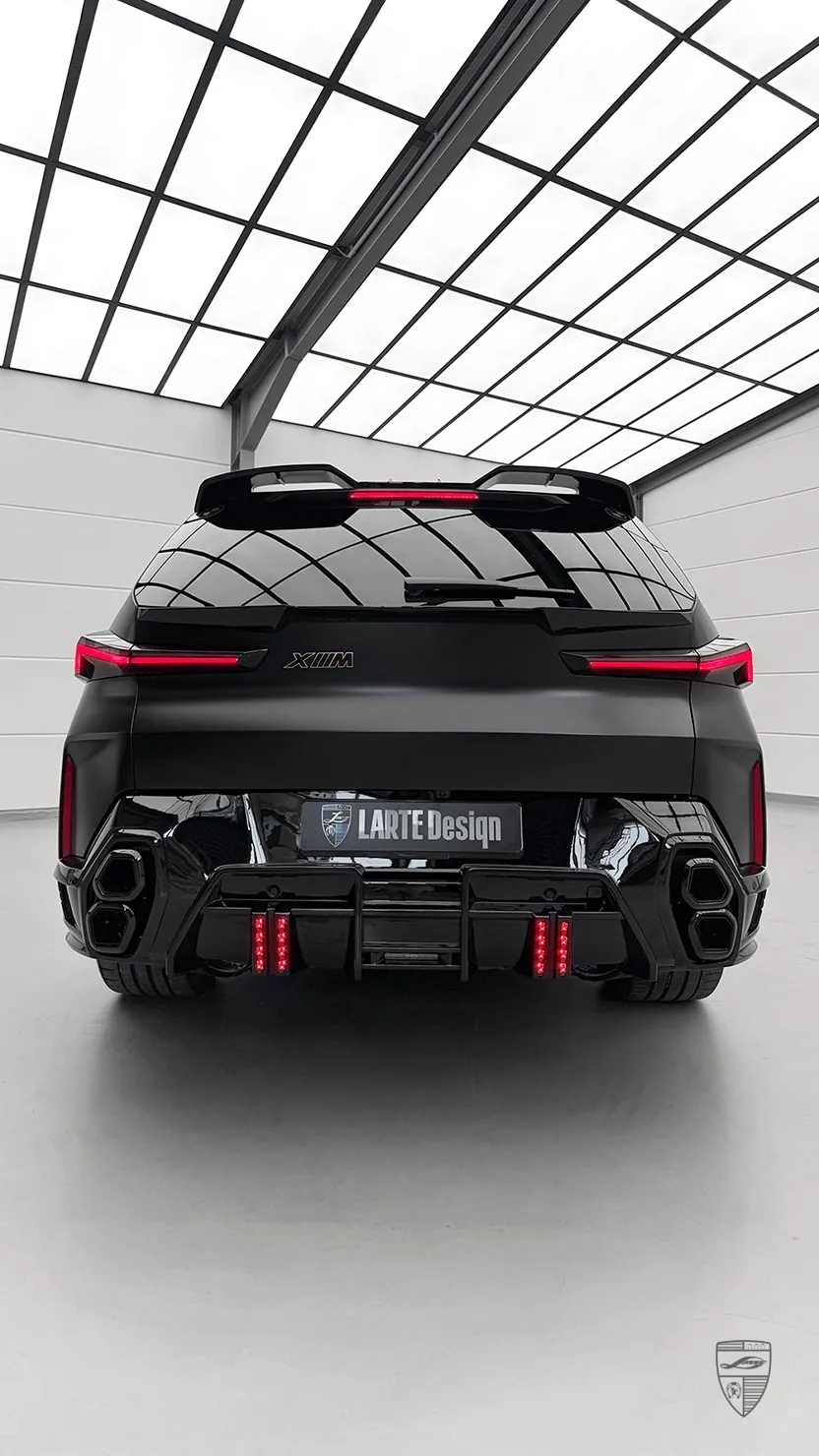 BMW XM rear view with body kit by Larte Design in urban setting