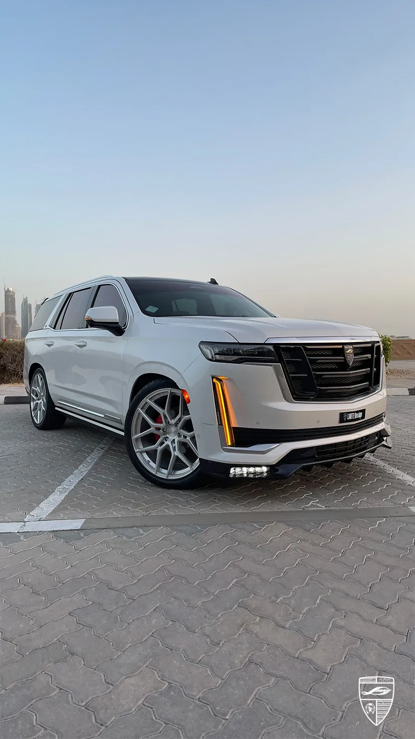 Cadillac Escalade in white with custom luxury SUV exterior styling
